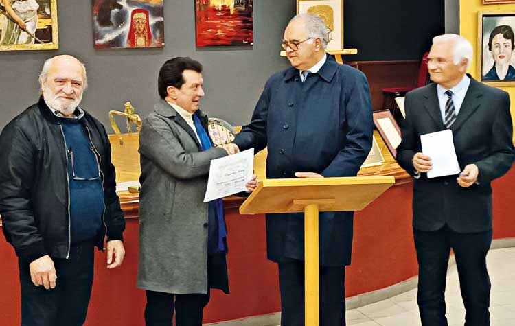 Τιμητική διάκριση στον Κώστα Ευαγγελάτο