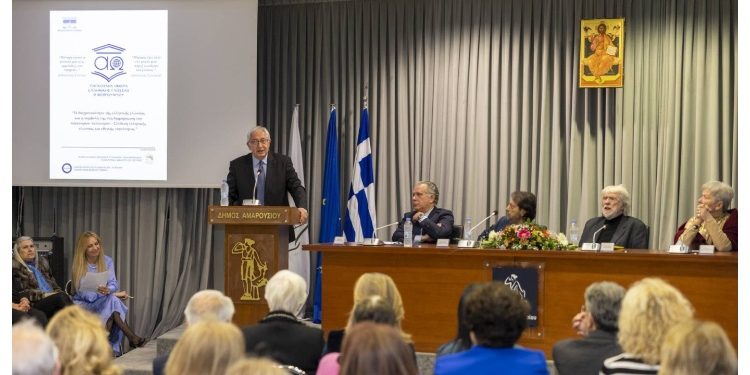 Εκδήλωση με θέμα «Η διαχρονικότητα της ελληνικής γλώσσας και η συμβολή της στη διαμόρφωση του παγκόσμιου πολιτισμού», η οποία τελούσε υπό την αιγίδα της Βουλής των Ελλήνων πραγματοποιήθηκε την Πέμπτη 19 Μαρτίου στην κατάμεστη αίθουσα συνεδριάσεων του δημαρχείου Αμαρουσίου